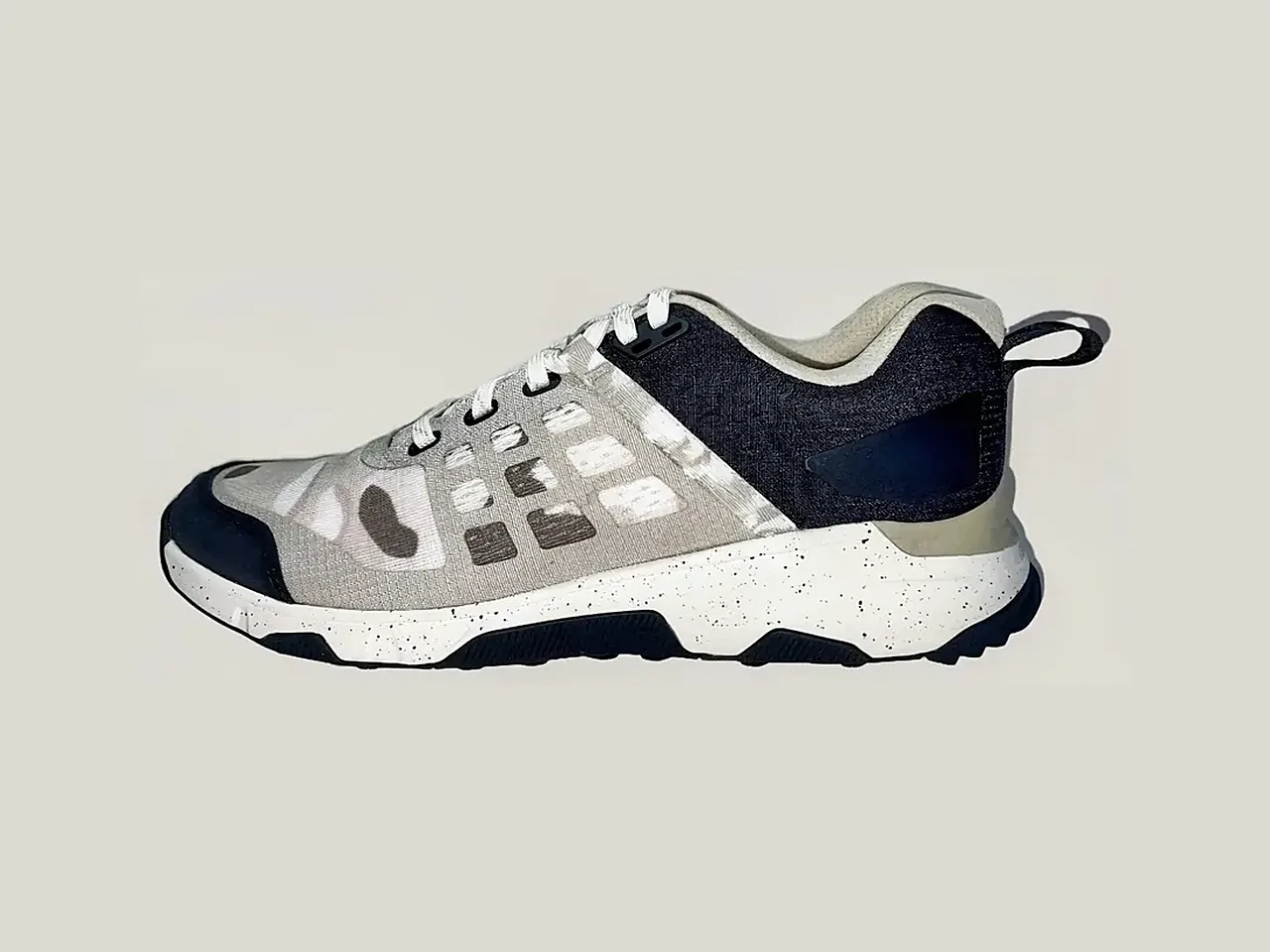 Running shoe with engineered knit upper